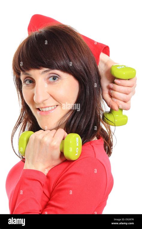 Brunette Woman During Fitness Exercise With Dumbbells Training With