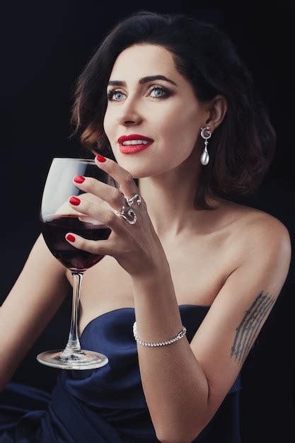 Premium Photo Beautiful Woman Holding A Glass Wine