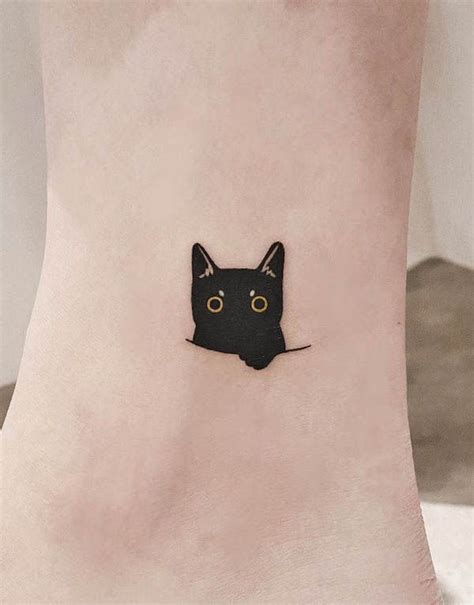 A Small Black Cat Tattoo By Tattooartistolive Minimalist Tattoos