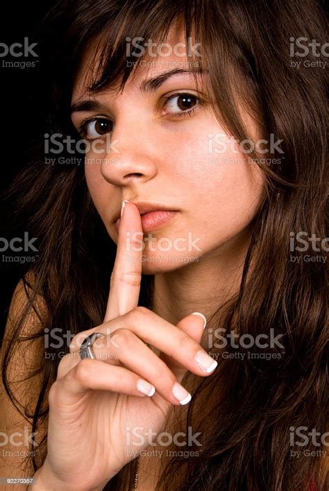 Beautiful Brown Eyed Woman In Silence Gesture Stock Photo Download