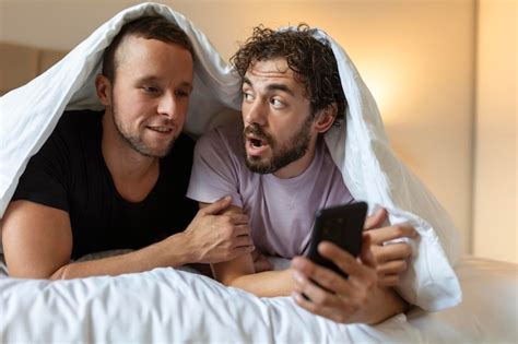 Premium Photo Happy Gay Couple Having Tender Moments In Bedroom