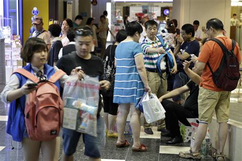 Chinese tourists are spending less on shopping, survey finds