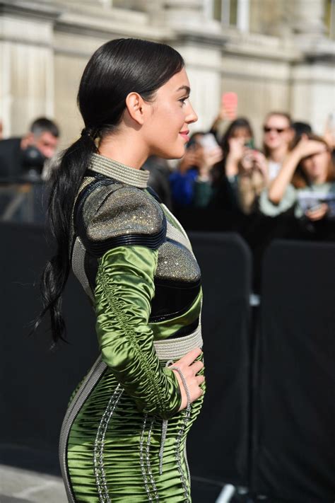 The model, posed in a rose coloured swimsuit for italian brand effek.georgina. Georgina Rodriguez at Balmain Show, Paris Fashion Week 09 ...