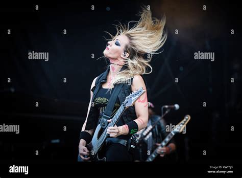 Musician And Guitarist Nita Strauss Performs Live With Alice Cooper