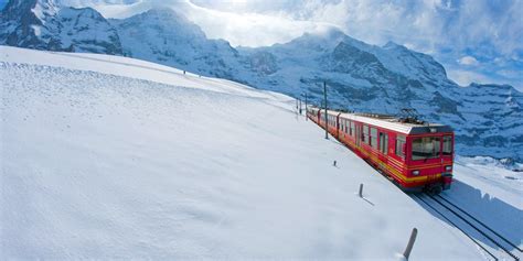 Eiger Railway Door And Jungfraujoch Railway Train Passing Eiger
