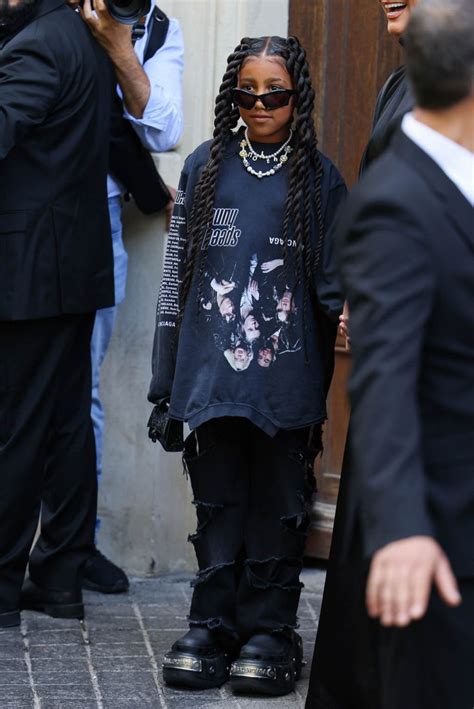 North West Goes Grunge In Distressed Jeans And Crocs For Balenciaga Show