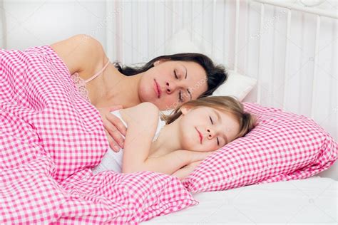 Mother And Daughter Sleep In Bed Stock Photo Marishu