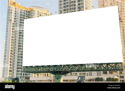 Billboard Blank On Road With City View Background For Advertising Stock
