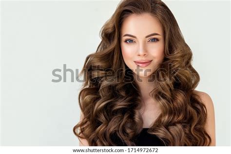 Beautiful Laughing Brunette Model Girl With Long Curly Hair Smiling