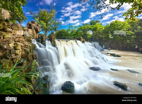 Beautiful Waterfalls In Ecotourism With Water Flowing Smooth As Silk