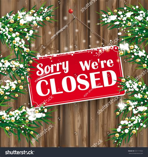 Christmas Fir Twigs With We Are Closed Sign And Snow On The Wooden