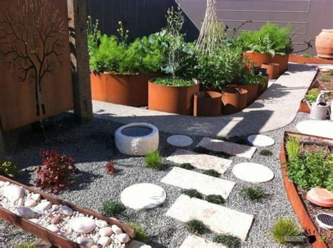 We absolutely love how the wide joint spacing of the paver layout draws your eye to the lush, green grass underneath. 15 Ideas for White Sensation in Garden Landscaping With White Pebbles