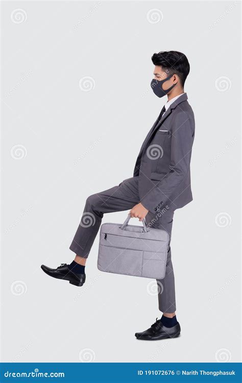 Portrait Young Asian Businessman In Suit Wearing Face Mask Walk Step