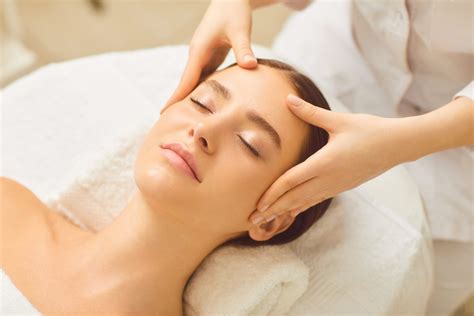 Beautiful Girl Has A Facial Massage In A Beauty Clinic Red Bamboo Medi Spa
