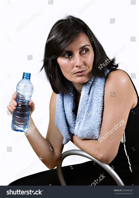 Woman Of Medium Age Resting After Doing Exercise With A Water Bottle Ad Sponsored Age