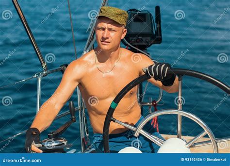 Naturist Sailing Boy