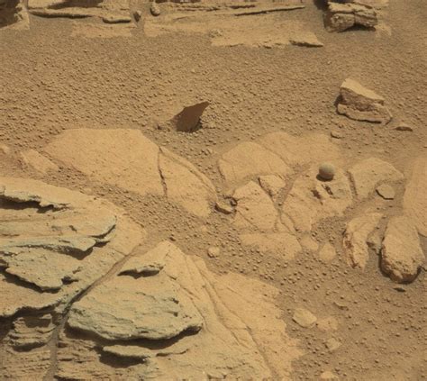 This image from nasa's mars rover curiosity shows what scientists have dubbed the otjizonjati outcrop in the distance to the northwest. Curiosity rover finds strange features on Mars ...