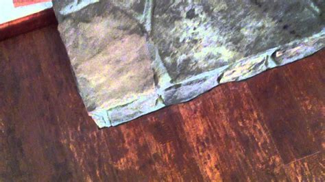 How To Cut Laminate Flooring Next To A Stone Fireplace Youtube