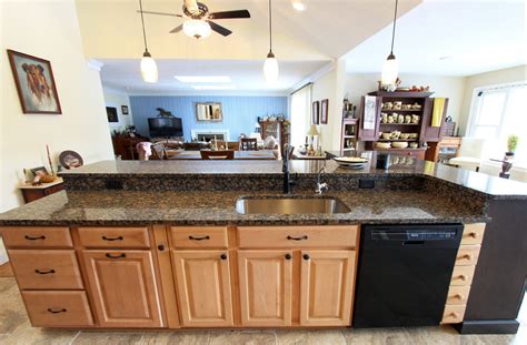 Kitchen island is centered on wall, not vault. Open Concept Kitchen with Vaulted Ceiling and Waypoint ...