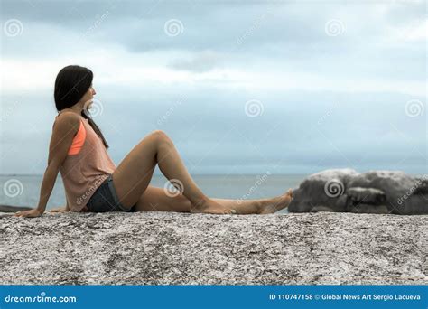 Woman Sitting On A Rock At Sunset On Bakovern Beach Cape Town Stock Photo Image Of Lady