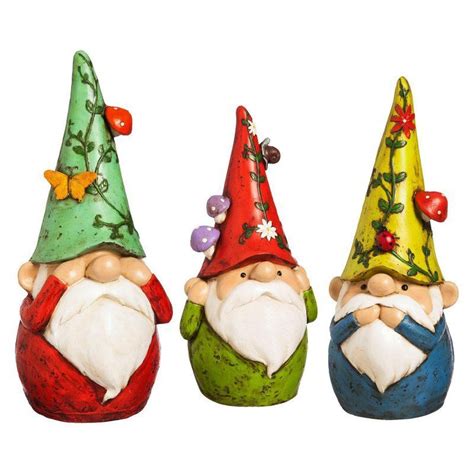 Photo about this is a see no evil gnome in the backyard garden. Evergreen Enterprises Hear See Speak No Evil Gnome ...
