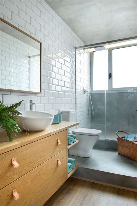 In this bathroom designed by arent & pyke, the tiled wall will make a statement in a powder room with an unexpectedly bold pastel. Stylish Ways To Modernize A Subway Tile Shower