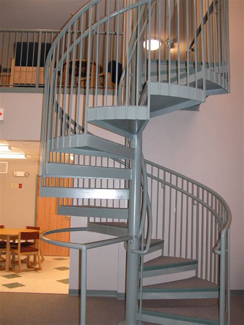 How to build floating stairs step by step. Spiral Staircase at new Student Housing - Russell ...