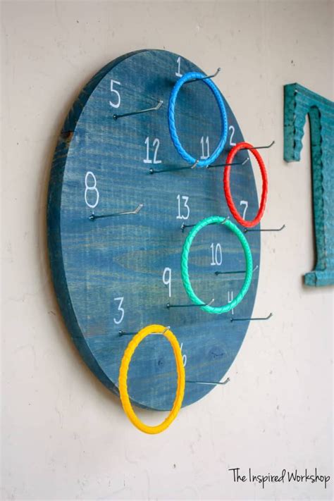 Remove the outer ring from the embroidery hoop. DIY Ring Toss Game | Ring toss, Diy rings, Toss game