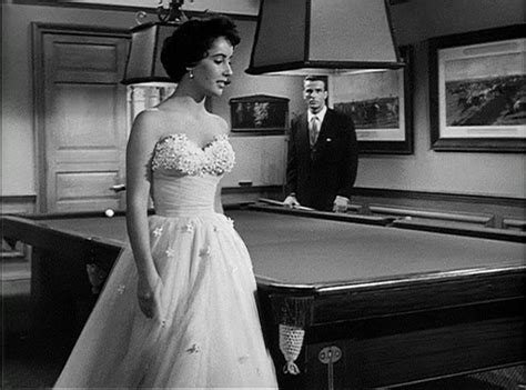 A poor boy gets a job working for his rich uncle and ends up falling in love with two women. ELIZABETH TAYLOR GOWN FROM A PLACE IN THE SUN - Current ...