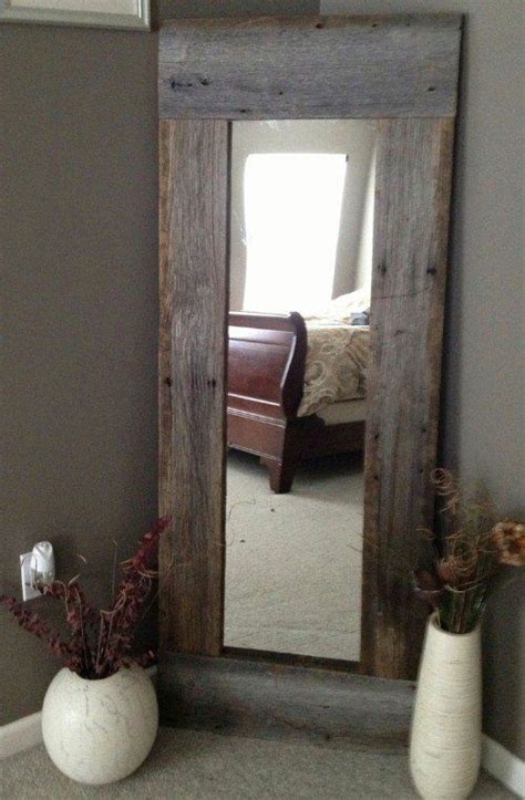 This is a nice a way to fill up a bedroom wall, particularly if you don't have enough space in your bathroom for larger pieces. 20 Reclaimed Wood Ideas - MessageNote