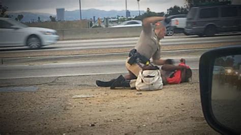 Shock Video Cop Allegedly Beats Woman On Freeway