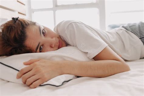 Happy Woman Just Wake Up On Her Bed In Warm Summer Morning Stock Photo