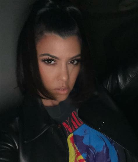 kourtney kardashian and fiance travis barker match in look alike outfits as fans accuse her of