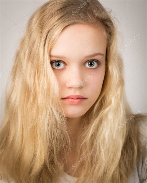 Beautiful Teenage Blond Girl With Long Hair Stock Photo By ©heijo 75835851