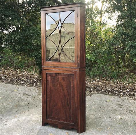 Looking for a corner curio this one is available in a rich mahogany. 19th Century English Mahogany Corner Curio Cabinet ...