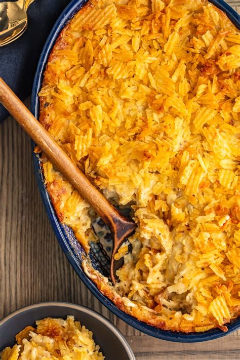 Cheesy potato casserole is better known to many as funeral potatoes, not because you only eat them at funerals, but because they're a staple for feeding large groups of people. Cheesy Potato Casserole - Hash Brown Potato Casserole Recipe