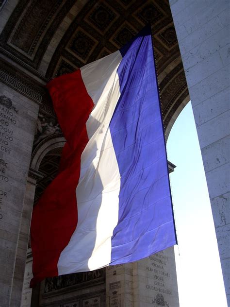 French Flag At The Arc De Triomphe David In France