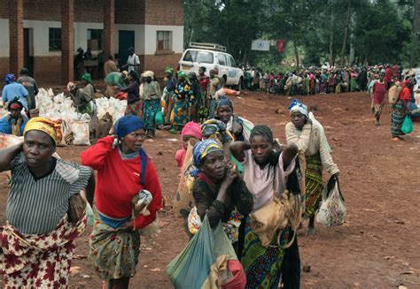 A Group Of Internally Displaced People At A Food Distribution Centre In