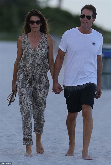 Cindy Crawford And Husband Rande Stroll Romantically On The Sand In