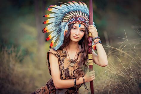 asian brown eyes brunette depth of field feather girl headdress long hair model native american