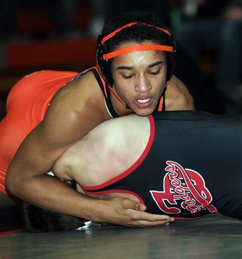 Ames Marcus Coleman Tries To Pin Fort Dodges Logan Kipfmiller During Their Match At 145 Pounds