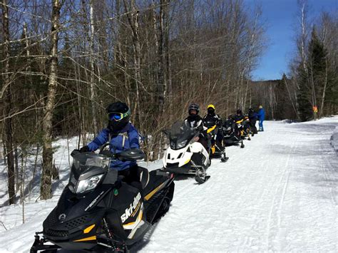 Snowmobiling In The Forks At The Center Of Maines Best Trails