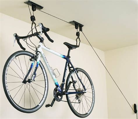 This bicycle storage solution offers a unique experience of an easy and simple space saving. New Bicycle Bike Lift Racor Garage Ceiling Mount Storage ...