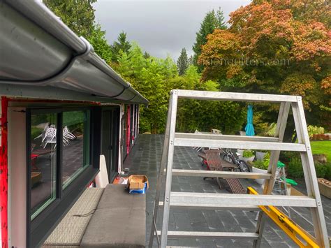 Lindab Rainline Gutter install in Vancouver BC. Anthracite is our ...