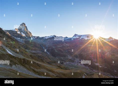 Aerial View At Sunrise Of Breuil Cervinia Village And Cervino Or