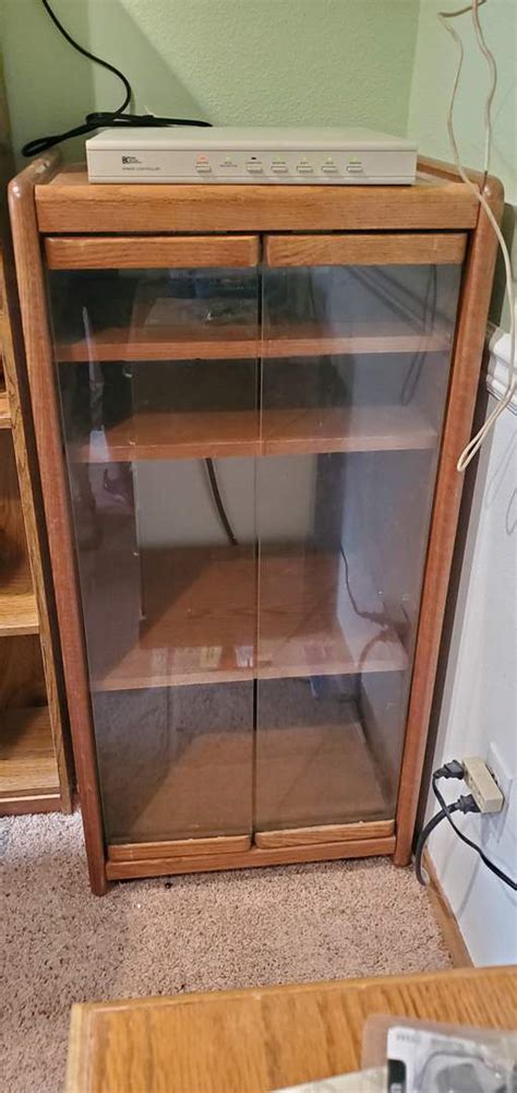 Lot 141 Oak Stereostorage Cabinet With Glass Doors Puget Sound