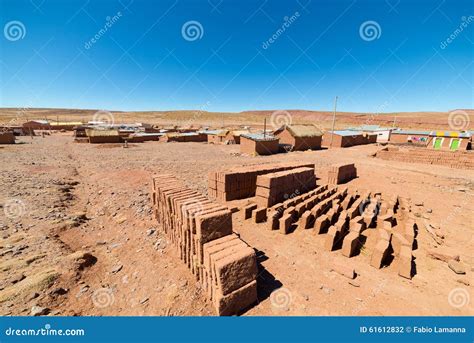 Adobe Village On The Desertic Andean Highlands In Bolivia Stock Photo