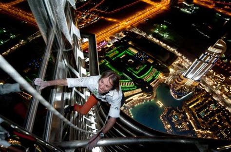 The building is 2,217 ft tall and features 28,261 glass panels on its exterior. 'Spiderman' Alain Robert Conquers World's Tallest Tower ...