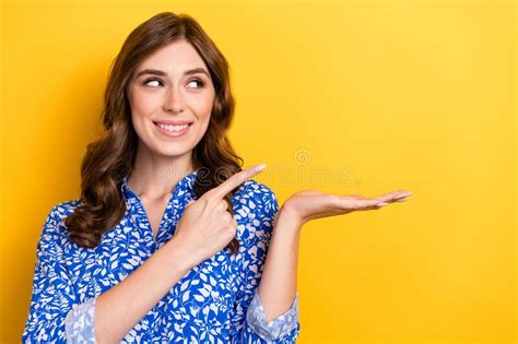 Photo Of Young Positive Assistant Girl Hold Palm Empty Space Direct