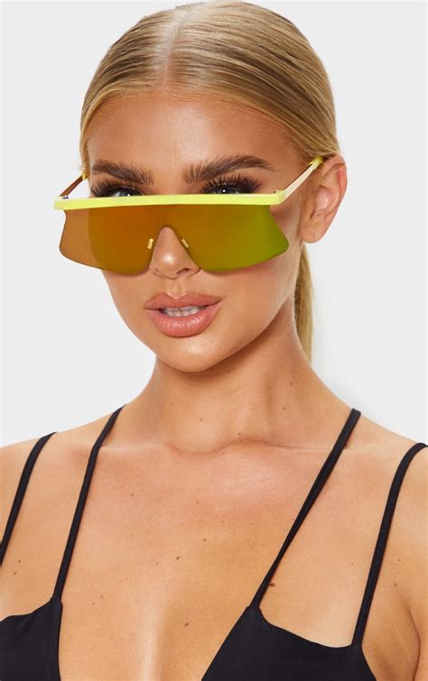 yellow flat top revo sporty sunglasses prettylittlething